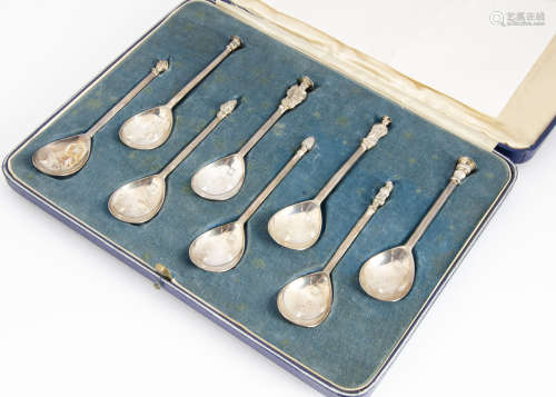 A 1930s set of eight silver coffee spoons by Thomas Bradbury & Sons, in fitted box, each with