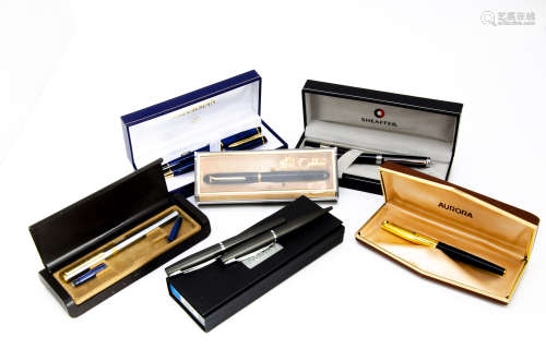 Eight boxed fountain and other pens, including a Watermans fountain pen and biro set, a Lamy set,