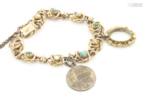 An Edwardian 15ct marked turquoise and seed pearl bracelet, the knotted links with alternate set