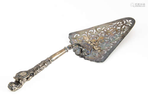 A George III silver cake slice by HS HB, with pierced triangular blade, repaired, handle with lion