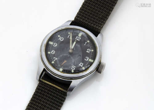 A Timor stainless steel military issue wristwatch, similar to a Dirty Dozen example, 36mm case,