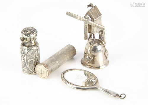 Four early to mid 20th Century collectable silver items, including a Dutch windmill cup, AF, a