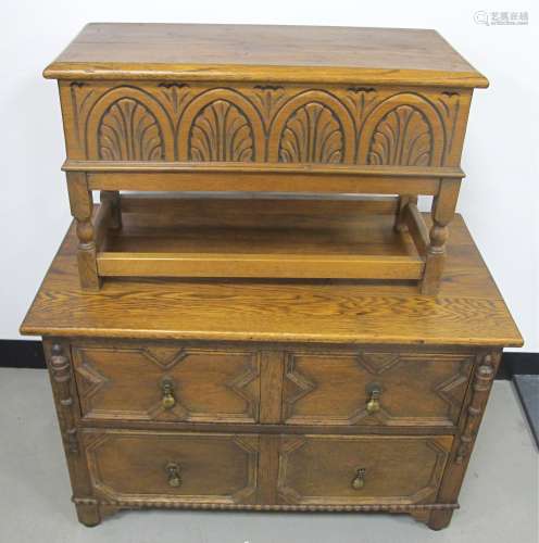 A 1920s oak two long drawer chest, with moulded decoration to drawer fronts and tear drop handles,