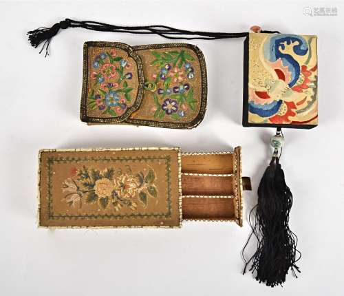 A 19th Century Chinese pouch purse, embroidered with flowers and foliage, 12cm x 9cm, together