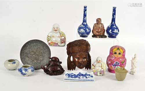 An assortment of Asian works of art, including a pair of overglaze polychrome laughing Buddhas,