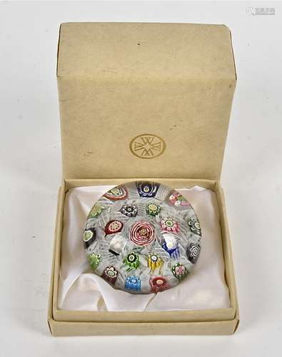 A large Clichy eighteen canned paperweight, with tightly packed millefiori canes and short lengths