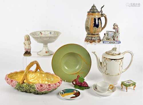 A collection of European porcelain, including a coffee pot, comport, a Sarreguemines Art Deco