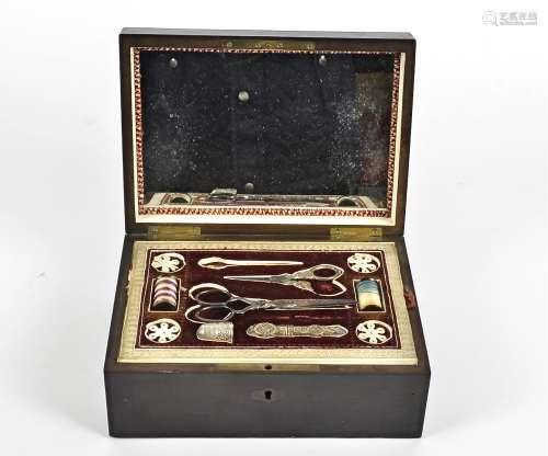 A 19th Century ebony inlaid tortoiseshell and brass sewing box, the hinge lid with mirrored