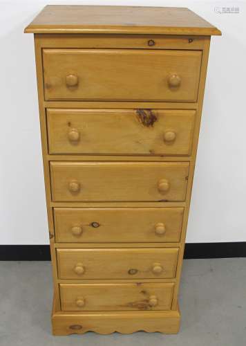 A contemporary pine six drawer tallboy, 51cm x 43cm x 118cm