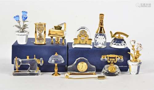 Ten Swarovski Crystal Memories models, of a telephone, pots of flowers, hourglass, radio, bottle