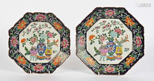 Two 19th Century Asian octagonal plates, both decorated with central scenes of three vases filled