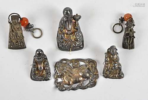 Six miniature items of Chinese silver, to include Immortals, one on horseback, others holding