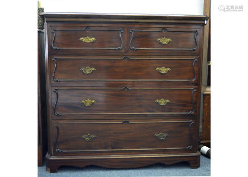A late 19th Century mahogany chest of drawers, moulded top with canted corners to the top and sides,