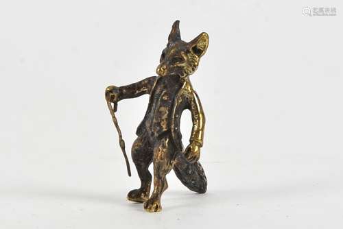 A miniature bronze figure of Mr Todd, dressed in gentleman's attire, height 3.5cm,