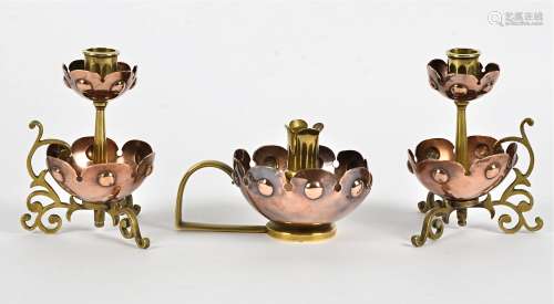 Manner of W.A.S Benson, a garniture of brass and copper Arts & Crafts era candlesticks, based on