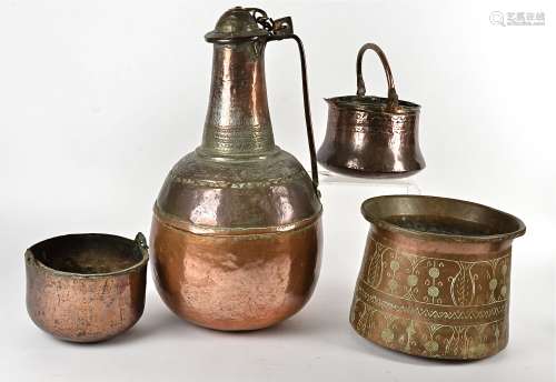 A collection of Zanzibar copper items, including bowls, pans and jugs, some with moulded and