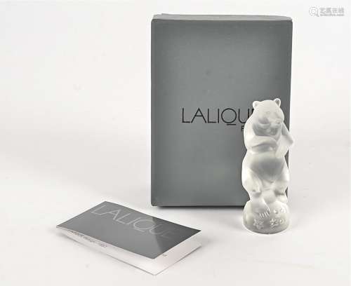 A 20th Century Lalique crystal performing bear, modelled dancing on a starry ball, with a satin