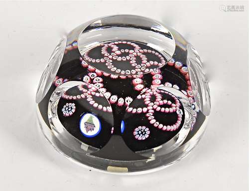 A Whitefriars five ringed glass paperweight’ with target design and faceted body, approximate