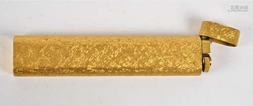 A 20th Century Cartier lighter, with textured exterior, length 12cm, with Cartier Paris impressed to