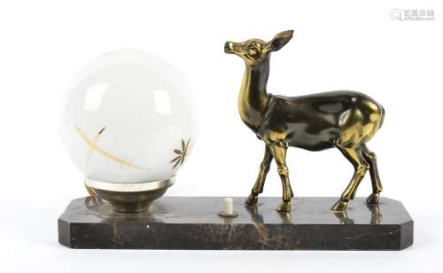 An Art Deco French table lamp, modelled as a standing fawn on a black plinth base next to opaque
