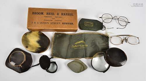 A collection of various early 20th Century spectacles, comprising a monocle with yellow metal frame,