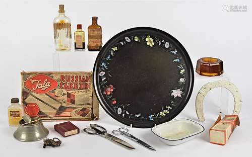 A quantity of apothecary bottles, with labels and stoppers, together with metal and orange glass ash