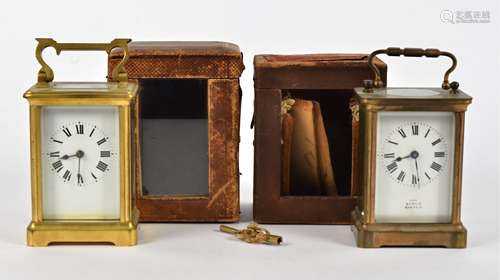 Two late 19th Century brass carriage clocks, both with white enamel dials with Roman numerals, one