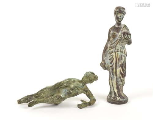 Two bronze figures, modelled in the antique style, one of a woman in classical attire holding a bowl