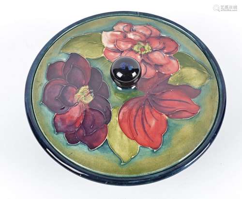 A 1930s Moorcroft Clematis pattern bowl and cover, on green ground, facsimile printed signature to