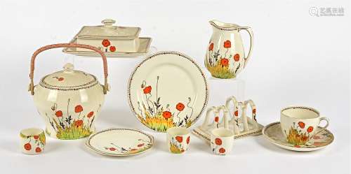 A large quantity of Crown Ducal Poppy pattern A1915 table wares, to include two butter dishes, a