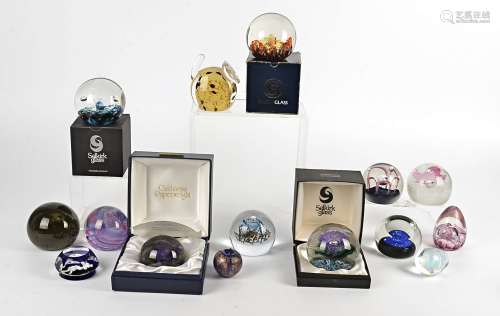 A quantity of 20th Century studio glass paperweights, to include examples by Caithness, 'Critical