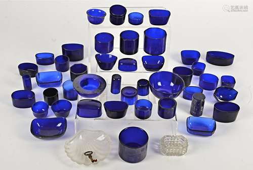 A large quantity of blue glass liners, in assorted shapes and sizes (55+)