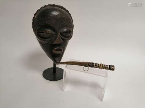 A Chockwe mask, Angola, length 30cm with an Algerian jimbaya knife (2)