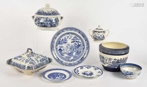 An extensive collection of blue and white British pottery, mostly in the willow pattern, some 19th