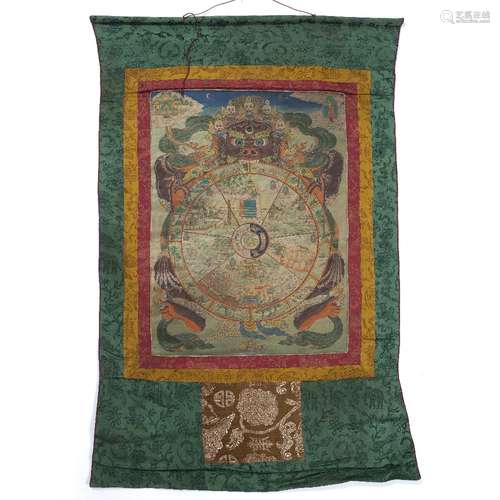 Two Mandalas Tibetan, 20th Century the first depicting a cross legged Buddha, the second depicting