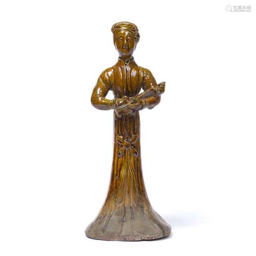 Treacle glazed tomb figure Chinese, Tang style the female figure holding a lute 21cm high