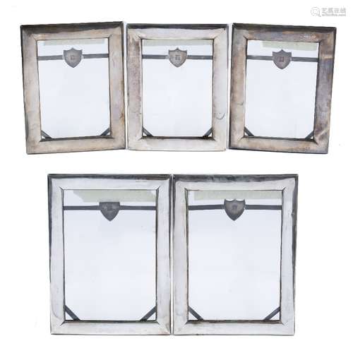 Five export silver picture frames Chinese, 19th Century of rectangular form, each with a shaped