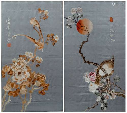 Pair of embroideries Chinese, 20th Century depicting flowers in bloom with birds sitting on a branch