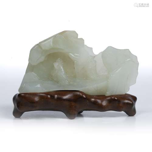 White jade pebble Chinese 19th Century carved as a mountain with a traveller on a path approaching a