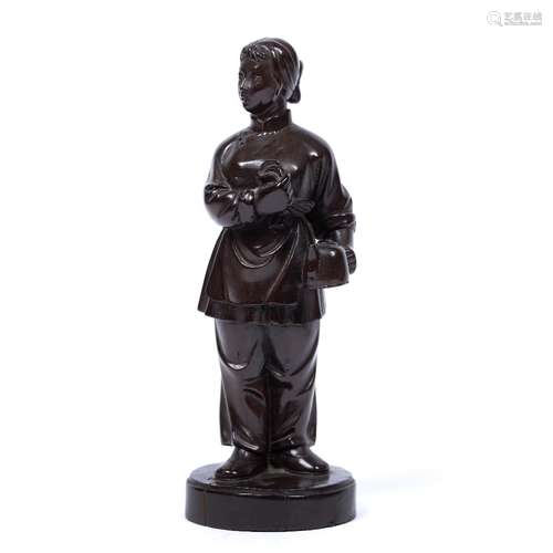 Carved wood cultural figure Chinese, Communist period depicting a girl holding a cloth in her