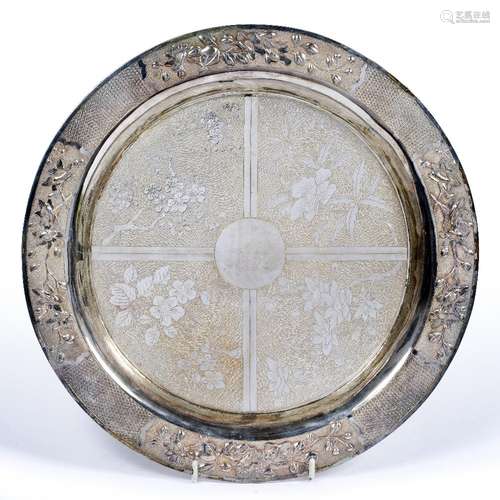 Silver circular dish Chinese, 19th/20th Century the centre decorated in four segments, each with