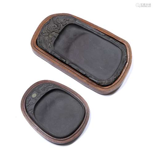 Two Duan ink stones Chinese the first of rectangular form, carved with one side with foliate