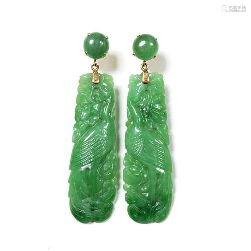 Pair of yellow metal mounted jade earrings depicting birds amongst leaves, butterfly backs,