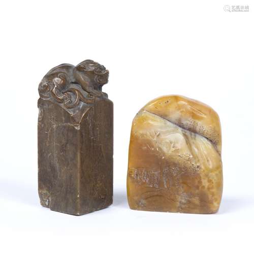 Two soapstone seals Chinese one carved as a mountain scene with Zhuanshu seal characters, the second