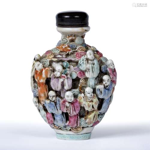 Moulded porcelain snuff bottle Chinese decorated with famille rose enamels depicting the 'Eighteen