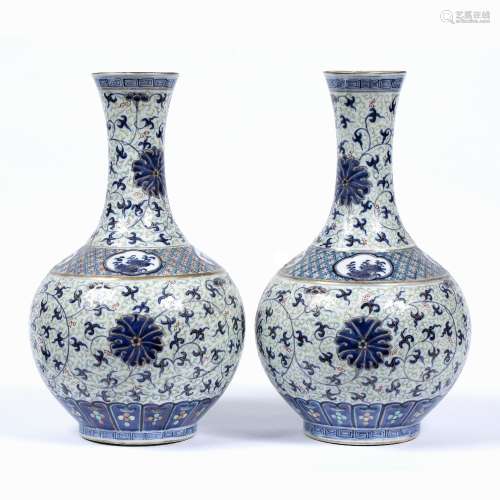 Pair of vases Chinese, 19th Century decorated in polychrome colours with Indian lotus decoration,