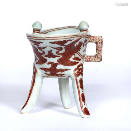 Porcelain libation cup Chinese decorated in over glazed red with cranes amidst scattered stylized