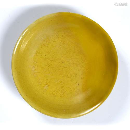 Yellow-glazed 'dragon' saucer Chinese, Xuande mark and possibly period incised on the interior