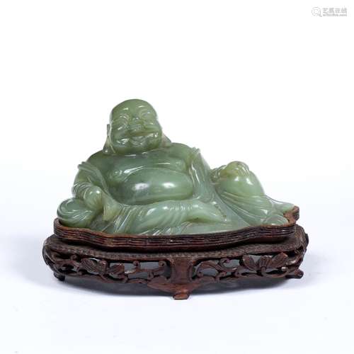 Jadeite recumbent Putai Chinese, early 20th Century the smiling Buddha leaning on a cushion, on a