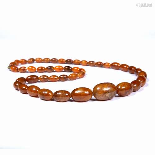 Amber necklace of graduated form 74cm long